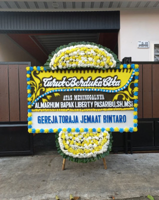 Papan Bunga Duka di Bumijaya